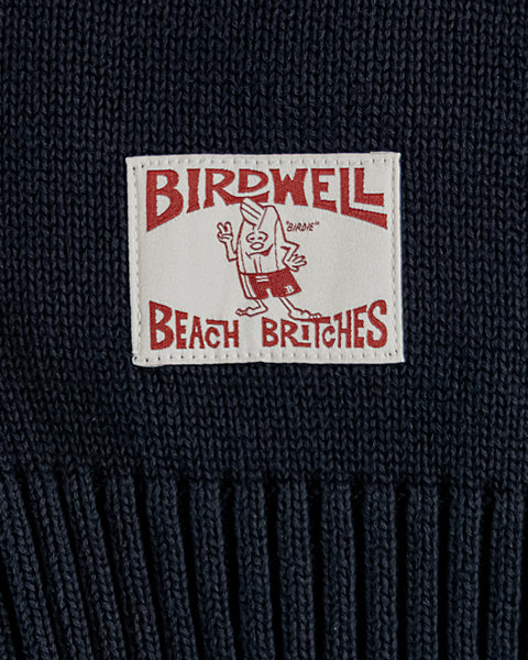 A white patch with red 