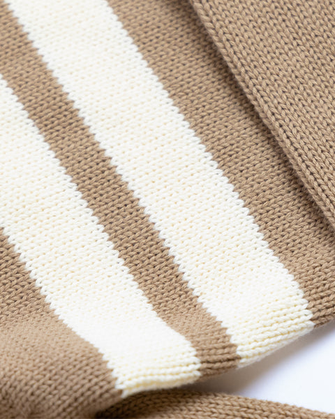 Close-up of the Comp Zip Sweater in Bark/Bone, showcasing its midweight 100% cotton knit with beige and white horizontal stripes. The detailed yarn texture and neat stitches reflect the sweater’s quality craftsmanship.