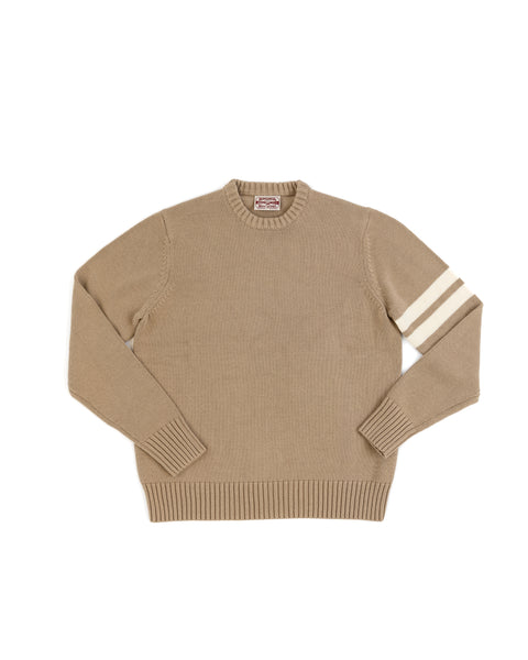 The Comp Stripe Sweater - Bark/Bone is a beige 100% cotton sweater with ribbed cuffs, collar, and hem, featuring two white stripes on the left sleeve, shown laid flat on a white background.
