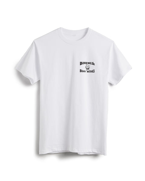 The License Plate T-Shirt - White/Black is a short-sleeve heavyweight cotton tee featuring a small black Birdwell Beach Britches logo and cartoon bird graphic on the left chest. Vintage-inspired and shown on a plain white background.