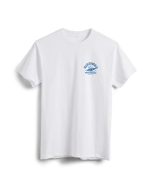The Surfin' Birdie T-Shirt - White/Blue is a 100% cotton short-sleeve tee featuring a small blue “BLAZINROOKS” graphic with a bird and text on the left chest, displayed against a white background.